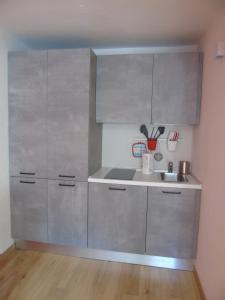 A kitchen or kitchenette at Affittacamere SveMilla