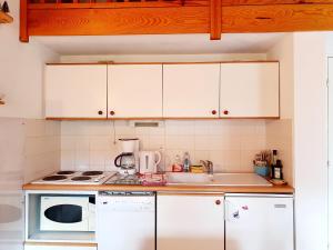 Kuchyň nebo kuchyňský kout v ubytování Au Pré du Moulin - CENTRE VILLE