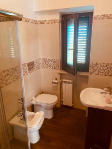 Koupelna v ubytování Agriturismo Torre Ercolana