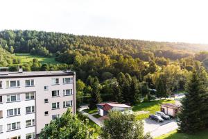 an aerial view of a building and a parking lot at Apartament Chillout in Ustrzyki Dolne