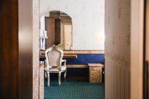 Postel nebo postele na pokoji v ubytování Hotel Villa Pigalle