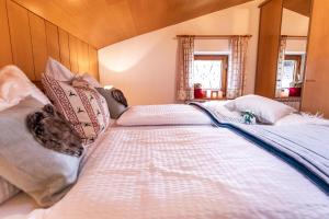 Posteľ alebo postele v izbe v ubytovaní Holiday im Gästehaus Warter in Altenmarkt