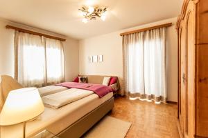 Posteľ alebo postele v izbe v ubytovaní Holiday im Gästehaus Warter in Altenmarkt