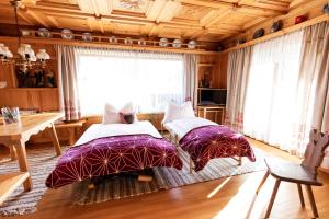 Posteľ alebo postele v izbe v ubytovaní Holiday im Gästehaus Warter in Altenmarkt