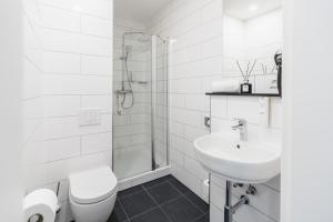 Koupelna v ubytování Libarty Hotels