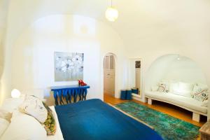 Posteľ alebo postele v izbe v ubytovaní ANTELMI LUXURY VILLA