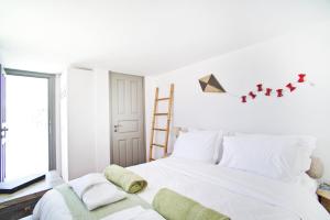 Posteľ alebo postele v izbe v ubytovaní ANTELMI LUXURY VILLA