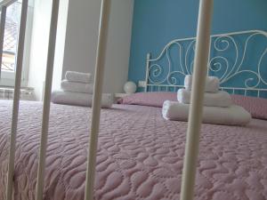 A bed or beds in a room at Affittacamere SveMilla