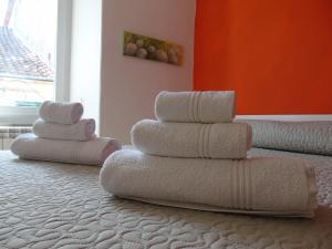 A bed or beds in a room at Affittacamere SveMilla