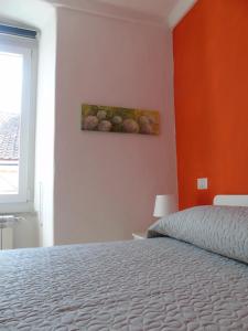 A bed or beds in a room at Affittacamere SveMilla