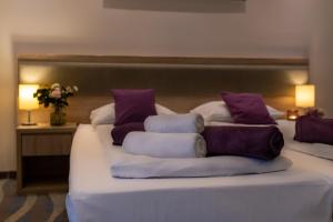 Ένα ή περισσότερα κρεβάτια σε δωμάτιο στο Hotel Bardo
