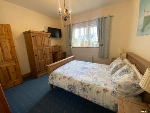 Letto o letti in una camera di Grangeview House