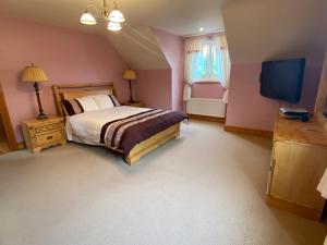 Letto o letti in una camera di Grangeview House