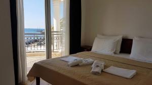 Postel nebo postele na pokoji v ubytování Adriatic Apartment