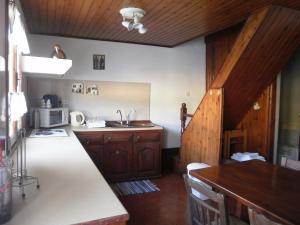 A kitchen or kitchenette at Harbour View Apartment