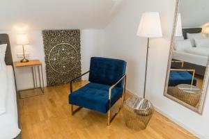 Posezení v ubytování City Apartments FN L7 KLIMATISIERT-mit Küche