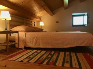 Кровать или кровати в номере VentodiMilazzo - Studio Loft