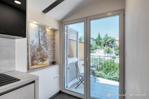 Kuchyň nebo kuchyňský kout v ubytování Penthouse Leonarda with private parking + 13 fotografií