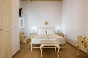 Posteľ alebo postele v izbe v ubytovaní Casa Nostalgia