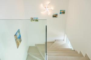 Fotografia z galérie ubytovania Villa Elena Deluxe mit Whirlpool und beheiztem Pool am Meer und wunderschönen Blick auf die Brijuni Inseln vo Fažane