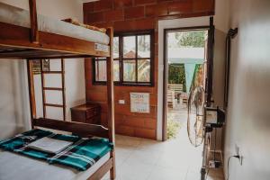 Postel nebo postele na pokoji v ubytování Esperanto Bed & Breakfast Surf Hostel