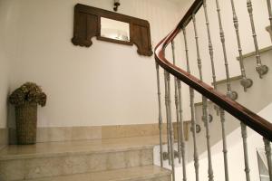 a staircase leading up to a stair case at Hotel Restaurante Rúas in Pontevedra