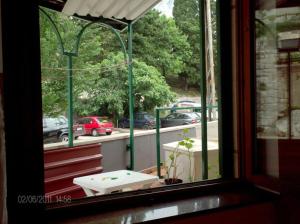 a window with a view of a parking lot at Villa Miranda - Croazia in Omiš