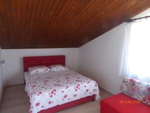 Postel nebo postele na pokoji v ubytování Apartments ORSIC