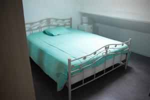 מיטה או מיטות בחדר ב-F4 duplex neuf et moderne, proche de Dunkerque