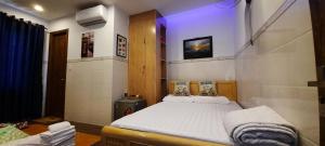 Postel nebo postele na pokoji v ubytování Sena home 3*3*Near Danang Dragon bridge*Han river + 30 fotografií