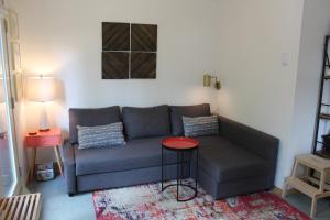 a living room with a couch and a table at Crystal Chalets in Greenwater