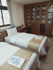 Katil atau katil-katil dalam bilik di Frank B&B