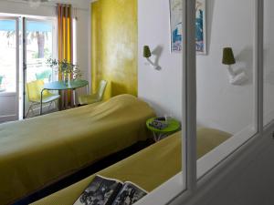 Tempat tidur dalam kamar di Le Val Duchesse Hotel & Appartements