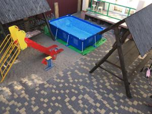 an overhead view of a playground with a pool at Миндаль in Zatoka +15 photos