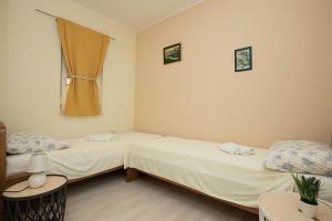Postel nebo postele na pokoji v ubytování Villa Martin