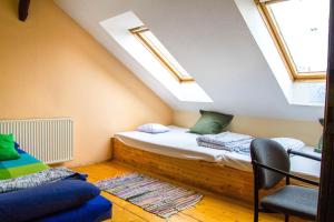 Postel nebo postele na pokoji v ubytování Unity Hostel Budapest + 19 fotografií