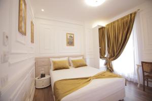 Postel nebo postele na pokoji v ubytování Eler Hotel