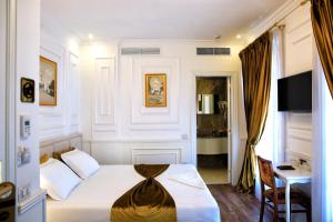 Postel nebo postele na pokoji v ubytování Eler Hotel