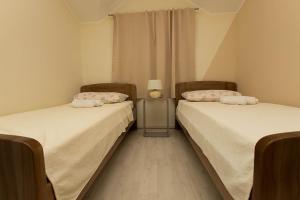 Postel nebo postele na pokoji v ubytování Villa Martin