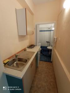 A kitchen or kitchenette at Hotel Giorgio