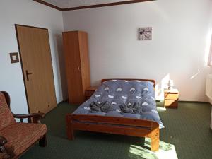 Postel nebo postele na pokoji v ubytování Gościniec Silver