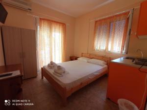 A bed or beds in a room at Hotel Giorgio