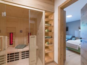 Tempat tidur dalam kamar di Appartements Retthäusl