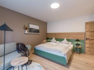 Tempat tidur dalam kamar di Appartements Retthäusl
