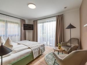 Tempat tidur dalam kamar di Appartements Retthäusl