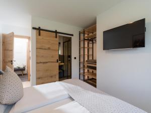 TV a/nebo společenská místnost v ubytování Appartements Retthäusl