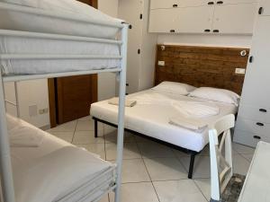 Postel nebo postele na pokoji v ubytování B&B Gli Archi