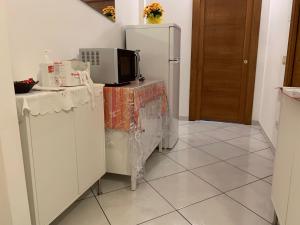 Kuchyň nebo kuchyňský kout v ubytování B&B Gli Archi