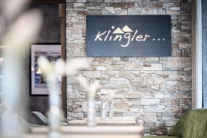 Majutusasutuses Hotel Klingler olev sertifikaat, autasu, silt või muu dokument