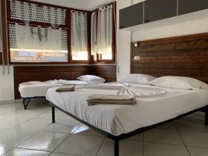 Postel nebo postele na pokoji v ubytování B&B Gli Archi